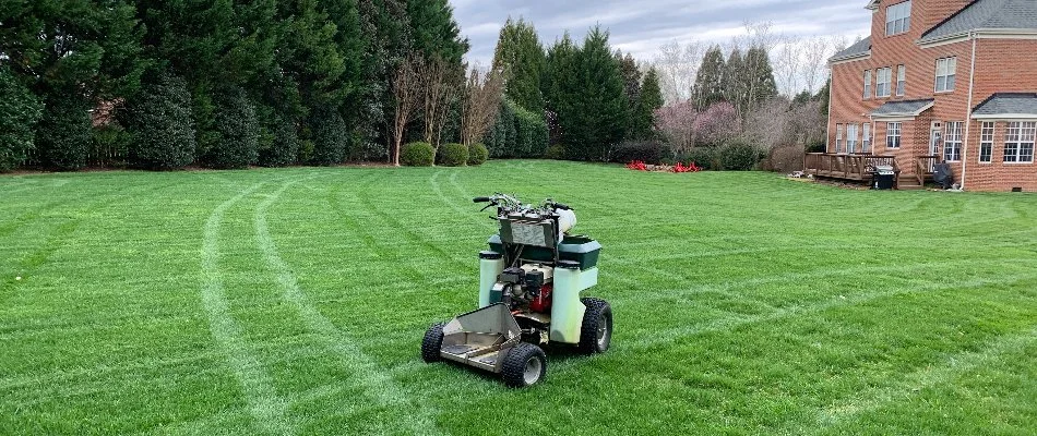 A piece of lawn care equipment on a lawn in Marvin, NC.